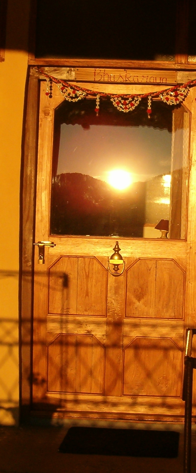 door reflecting sunrise